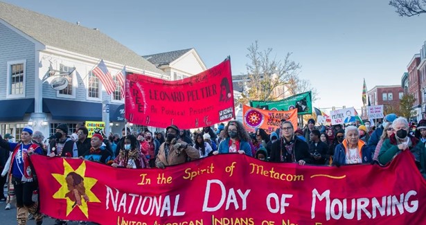 National Day of Mourning march - many people holding banners