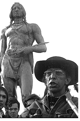Frank James Speaking in Front of Statue of Massasoit